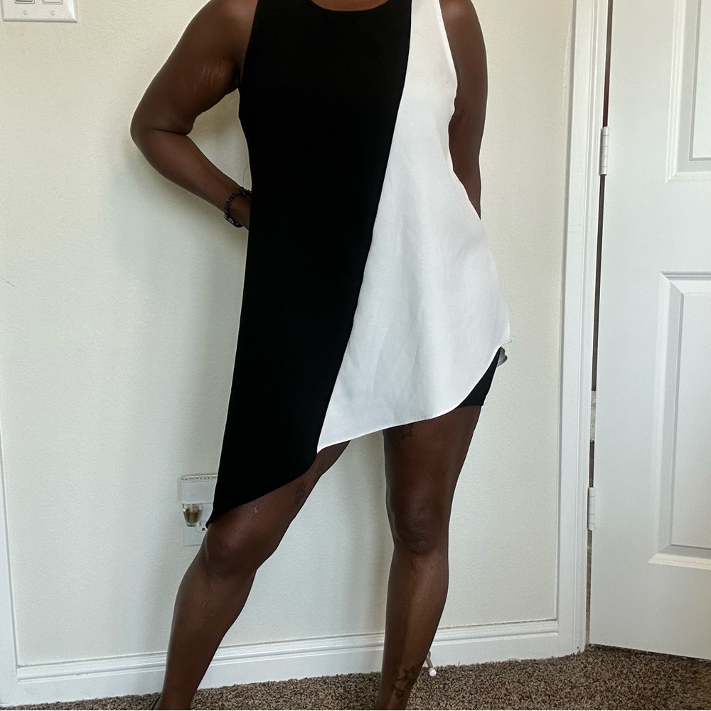 Black and white asymmetrical blouse.